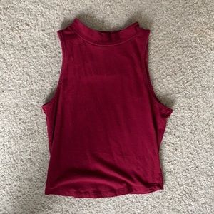 Burgundy tank top. Size medium.
